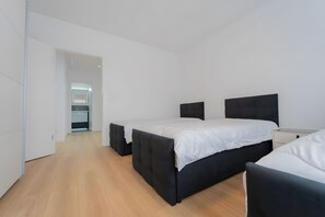 2 habitaciones, tabla de planchar con plancha, wifi y ropa de cama 