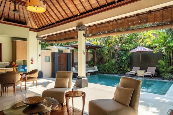 Comfort Villa, Pool View | Living area | 40-inch flat-screen TV with cable channels - Villa Elegant by Exotiq (Seminyak)