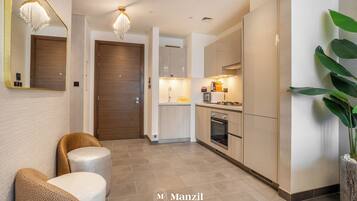 Appartement Luxe, balcon, vue ville | Coin cuisine privé