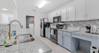 Spacious one level 4-bedroom house fully furnished with 2 car garage & backyard