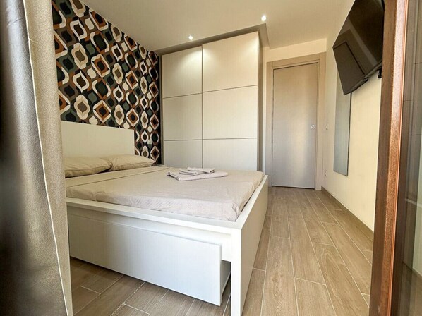 1 habitación, tabla de planchar con plancha, wifi y ropa de cama 