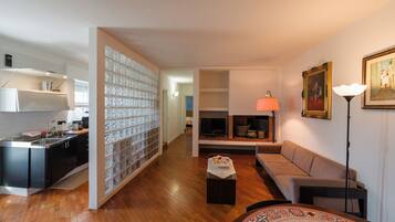 Apartamento luxo, vista para a cidade | Área de estar