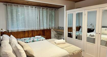 Creekside Rainforest Retreat, perfect for groups seeking a nature getaway.