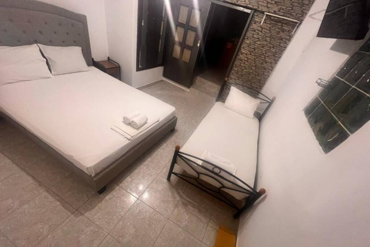 Economy Triple Room | Iron/ironing board, free WiFi