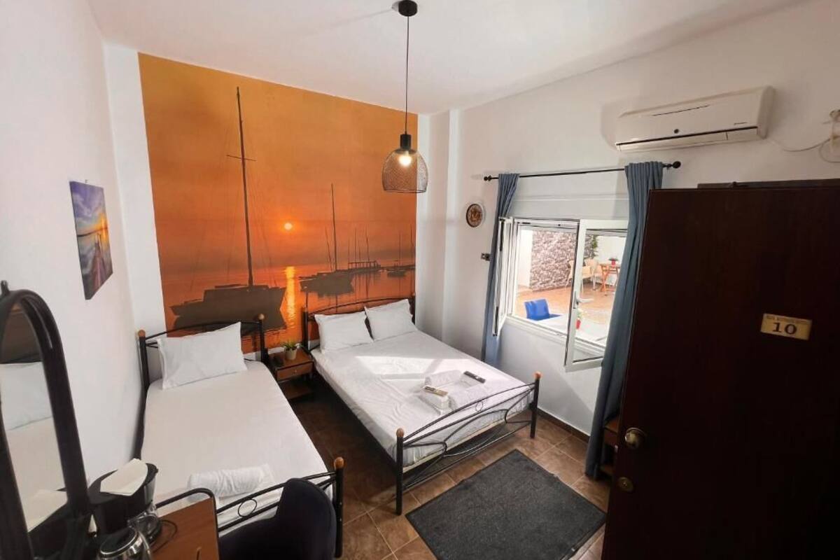 Economy Triple Room | Iron/ironing board, free WiFi