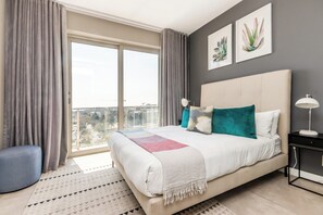 Luxury Apartment | Desk, laptop workspace, blackout curtains, iron/ironing board
