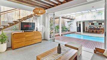 Villa, 3 Bedrooms, Pool View | Living area | 43-inch Smart TV with cable channels, Netflix, streaming services