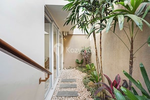 Villa, 3 Bedrooms, Pool View | Living area | 43-inch Smart TV with cable channels, Netflix, streaming services - Ombak Villa by Kozystay - Canggu (Canggu)