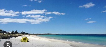 3 minute drive to the beach! Family home with a BBQ, boardgames, and a backyard.