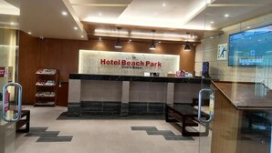A reception area with a sign reading "Hotel Beach Park" and a counter. - Hotel Beach Park (Cox's Bazar)