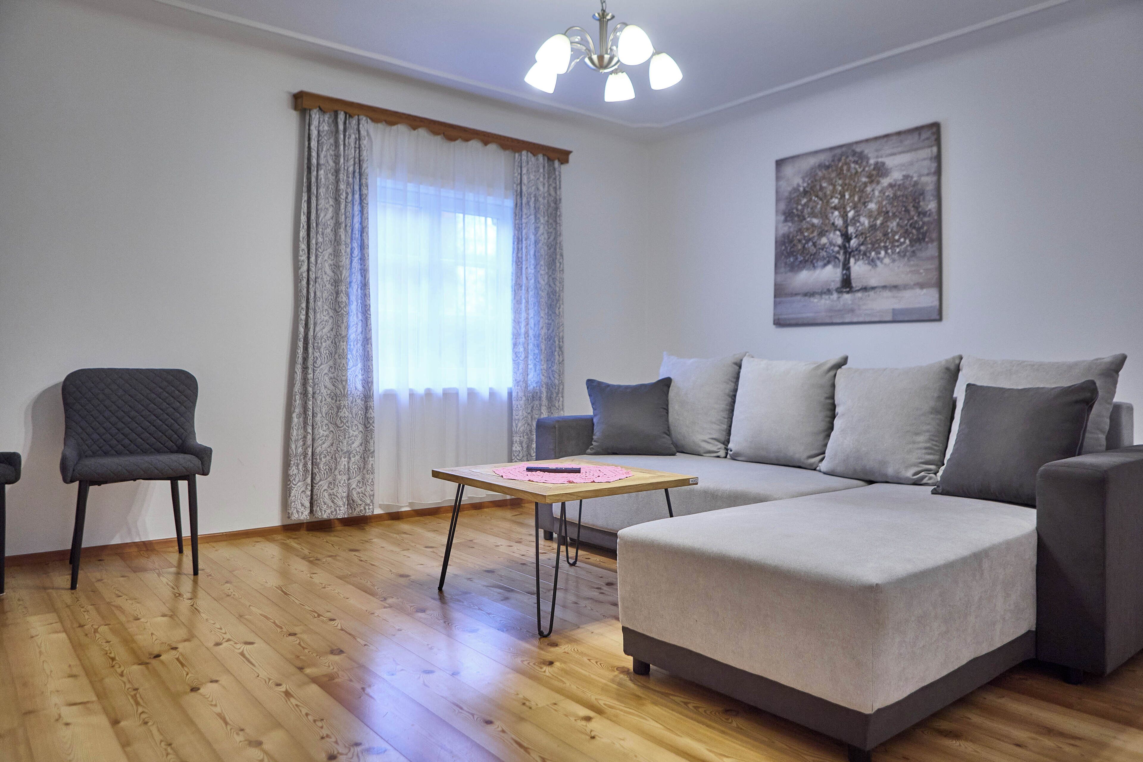 Comfort Condo, 1 Bedroom, Pets allowed, Garden View | Living area | 50-inch flat-screen TV with cable channels