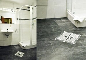 Shower, hair dryer, towels, toilet paper