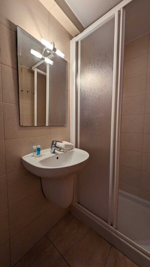 Hair dryer, towels, toilet paper