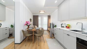 Classic Apartment, 3 Bedrooms, Balcony | Living area | 40-inch LCD TV with digital channels
