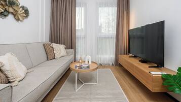 Classic Apartment, 3 Bedrooms, Balcony | Living area | 40-inch LCD TV with digital channels