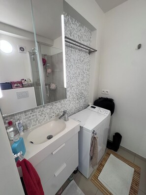Hair dryer, towels, soap, toilet paper