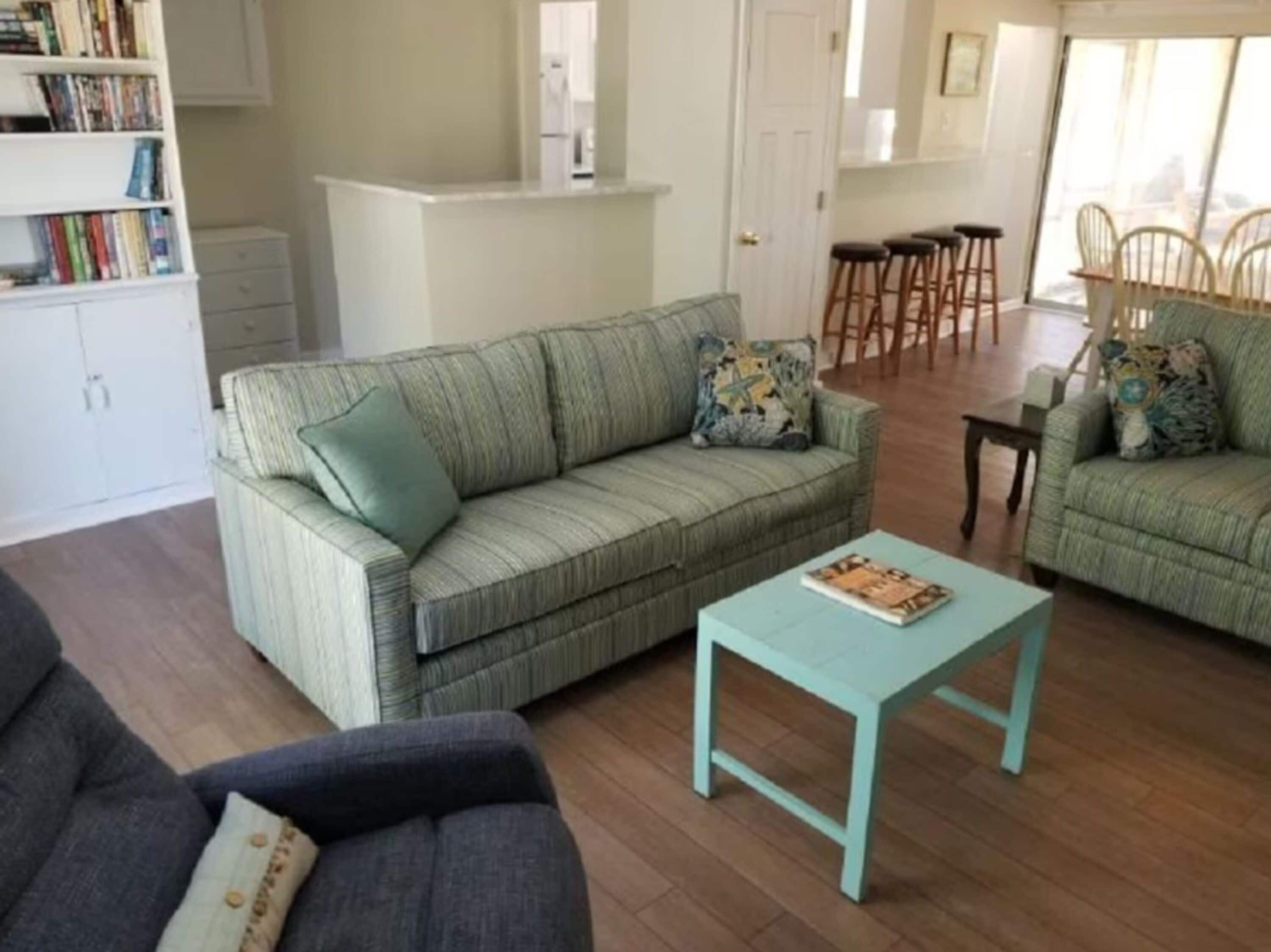 Signature Cottage, 3 Bedrooms, Patio | Living room | 32-inch Smart TV with digital channels