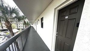 Property grounds - Waterfront 1BR condo on Marco Island with pool, marina access, WiFi. (Marco Island)