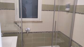 Standard Double Room, Patio, Courtyard View | Bathroom | Shower, free toiletries, hair dryer, towels