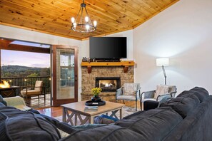 TV, fireplace, books, stereo
