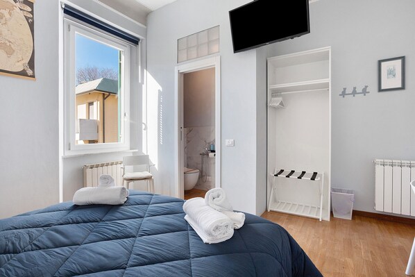 1 غرفة نوم ومكواة/لوح كي وواي فاي وملاءات أسرّة