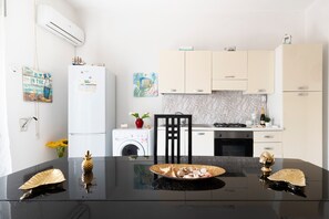 Fridge, oven, stovetop, cookware/dishes/utensils