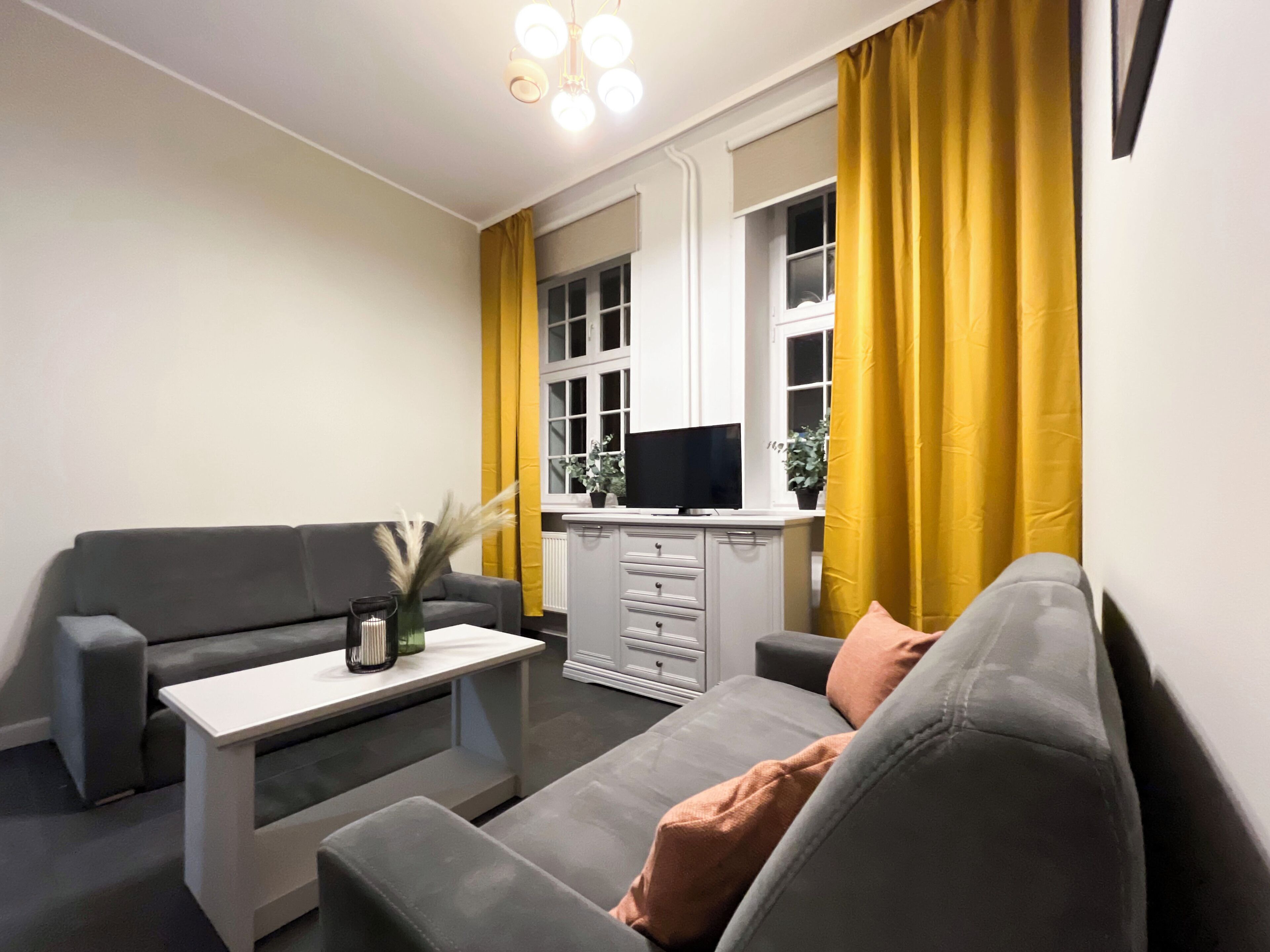 Apartment, Courtyard View | Living room | Flat-screen TV