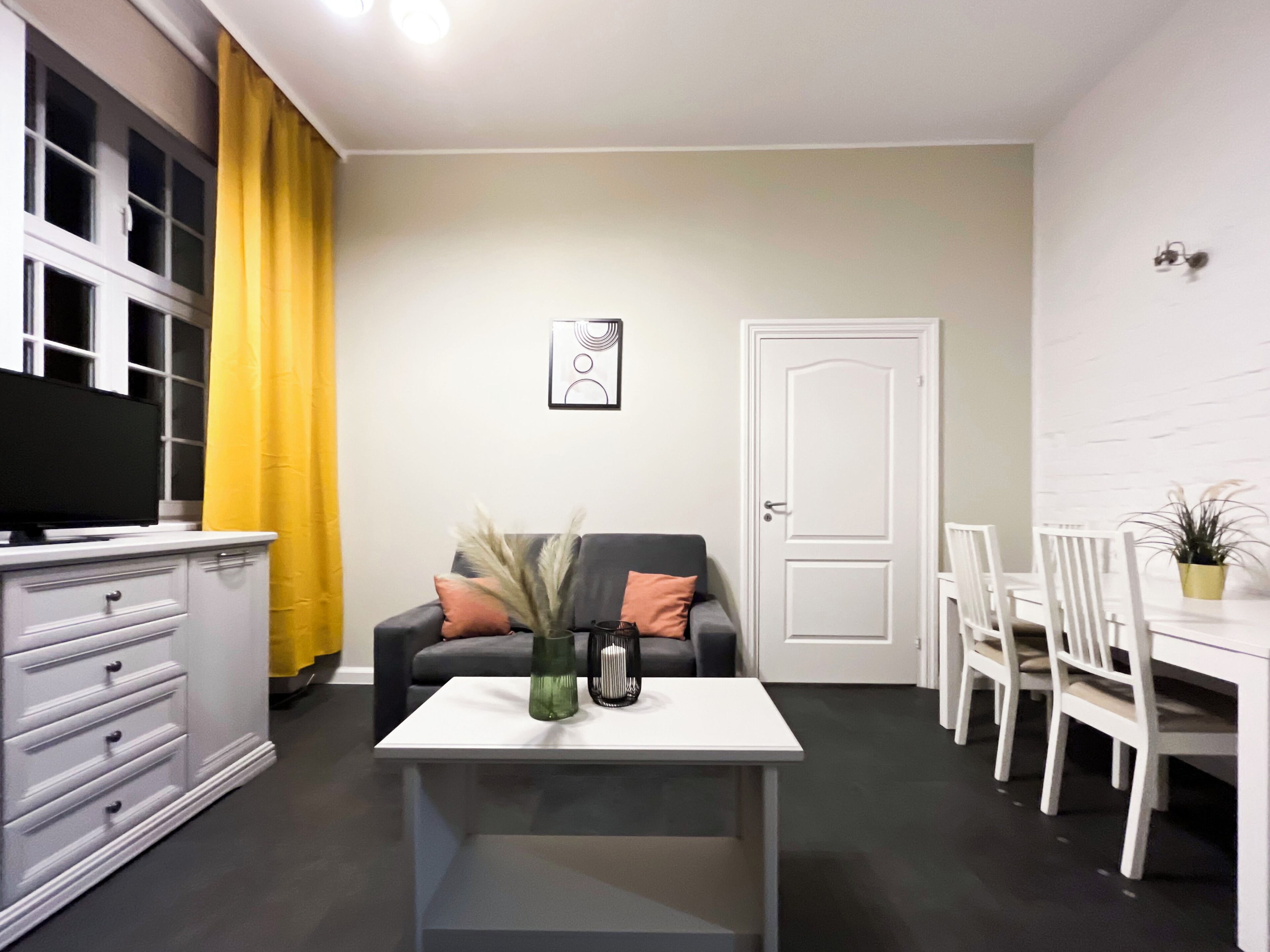 Apartment, Courtyard View | Living room | Flat-screen TV