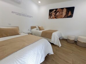 Desk, travel crib, free WiFi, bed sheets
