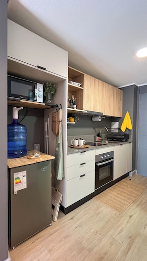 Apartamento conforto, sacada, vista para a cidade | Cozinha privada