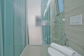 Hair dryer, towels, toilet paper