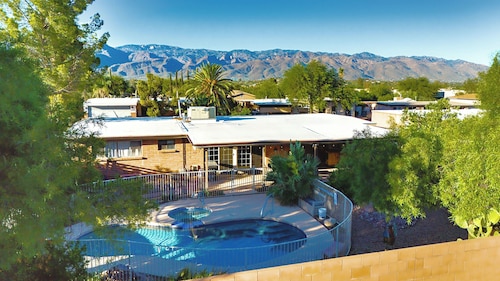 Relax at Sonoran Gem Escape-your private desert retreat with a sparkling pool, soothing spa, and mountain views.