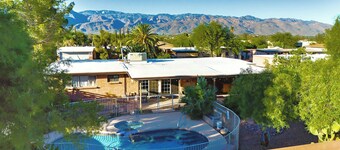 Relax at Sonoran Gem Escape-your private desert retreat with a sparkling pool, soothing spa, and mountain views.