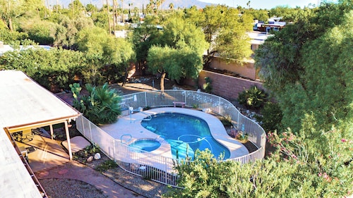 Relax at Sonoran Gem Escape-your private desert retreat with a sparkling pool, soothing spa, and mountain views.