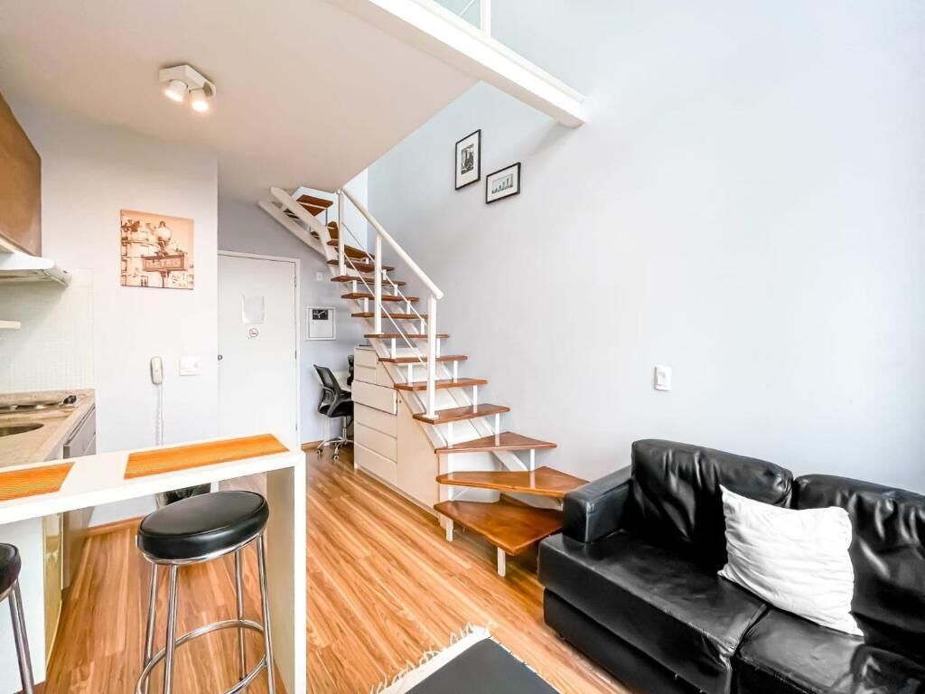 Departamento clásico, 1 cama Queen size y sofá cama | Área de sala de estar