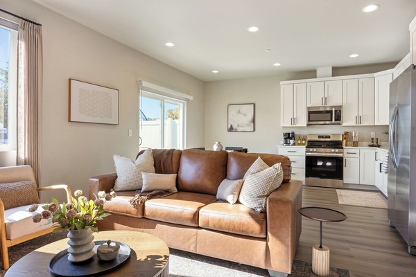 Open living, kitchen, and dining