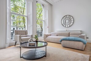 Premium Apartment, Balcony | Living area | 34-cm Smart TV with digital channels, Netflix, Hulu