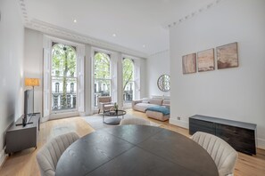 Premium Apartment, Balcony | Living area | 34-cm Smart TV with digital channels, Netflix, Hulu