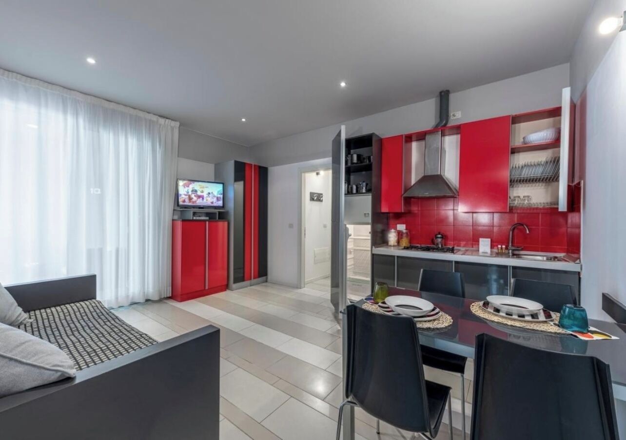 Suite, balcone | Area soggiorno | TV