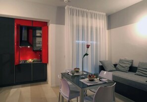 Family Suite, Balcony | Living area | TV - Residence Altomare (Riccione)