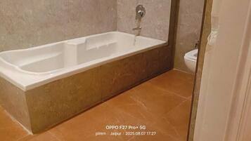 Deluxe Double or Twin Room, Balcony, Mountain View | Bathroom | Combined shower/bathtub, towels, soap, shampoo