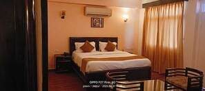 Desk, laptop workspace, blackout curtains, iron/ironing board - Hotel Glitz (Jaipur)