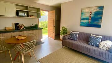 Deluxe Double Room, 1 King Bed with Sofa bed | Living area | Smart TV