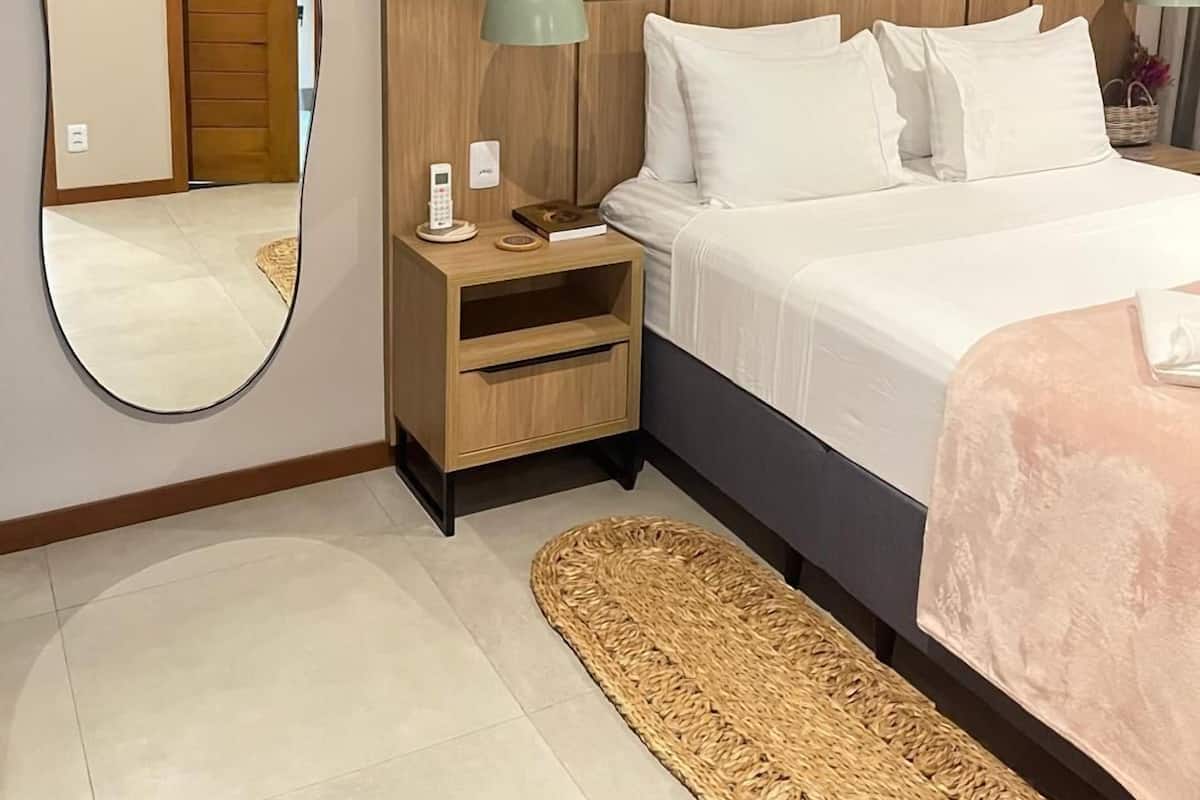 Premium bedding, blackout curtains, iron/ironing board, free WiFi