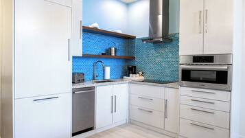 Stovetop, dishwasher, coffee/tea maker, dining tables