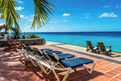 Casa Iguana, oceanfront 2 bedroom condo with spacious oceanfront deck
