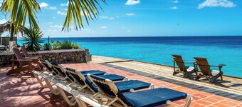 Casa Iguana, oceanfront 2 bedroom condo with spacious oceanfront deck