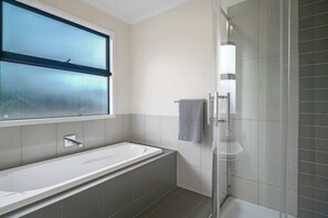 Shower, hair dryer, towels, soap
