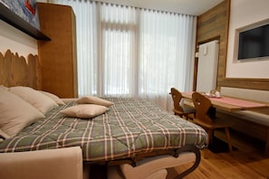 Wi-Fi de cortesia, roupa de cama