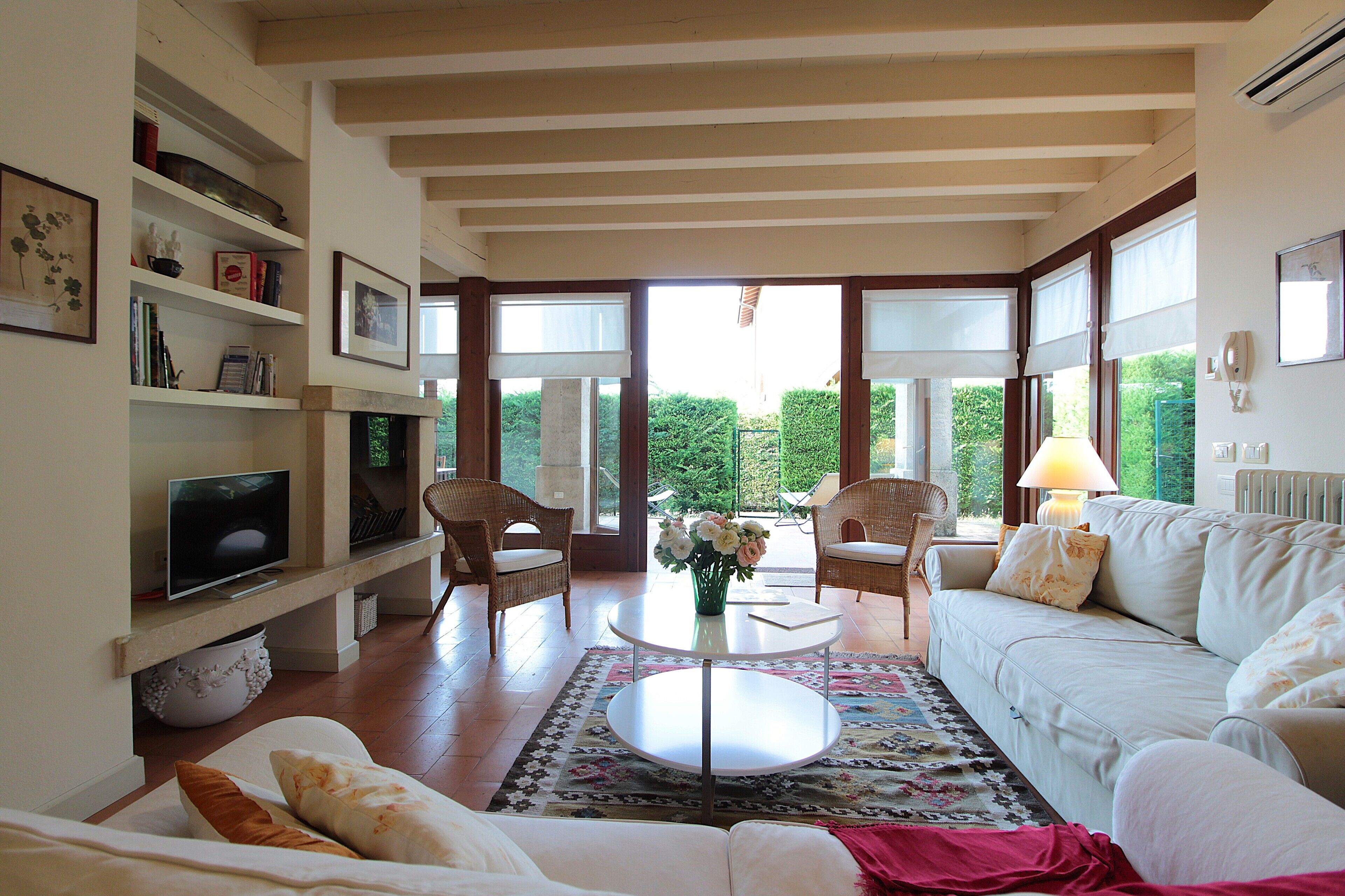 Apartment, Patio, Garden View | Living area | 32-inch flat-screen TV with digital channels